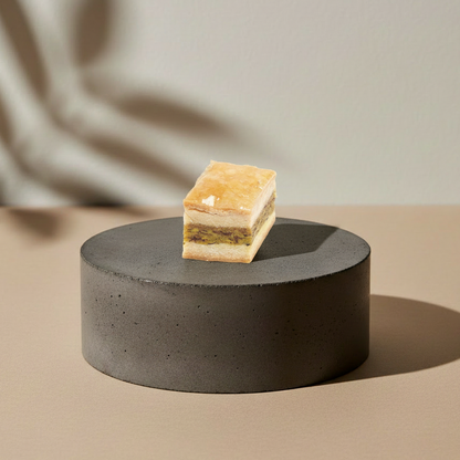Baklawa almond and pistachio on concrete pedestal